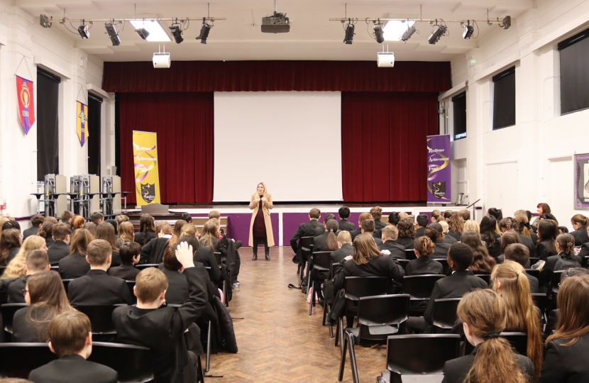 Julia Lopez MP addressing pupils at Sanders Draper Academy