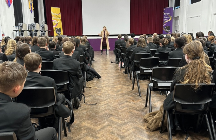 Julia Lopez MP addressing pupils at Sanders Draper Academy