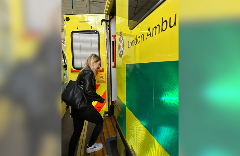 Julia stepping onto an ambulance.