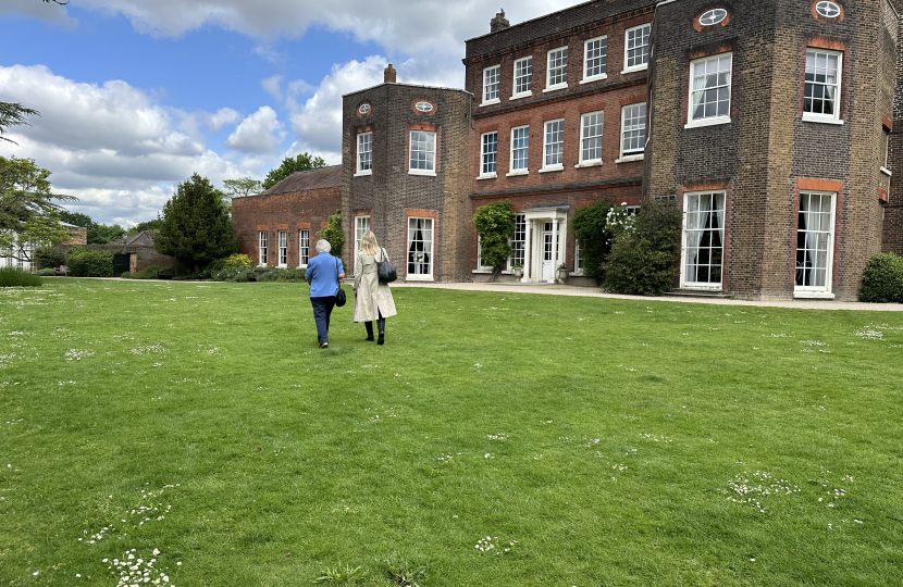 Julia walking across the lawn at Langtons