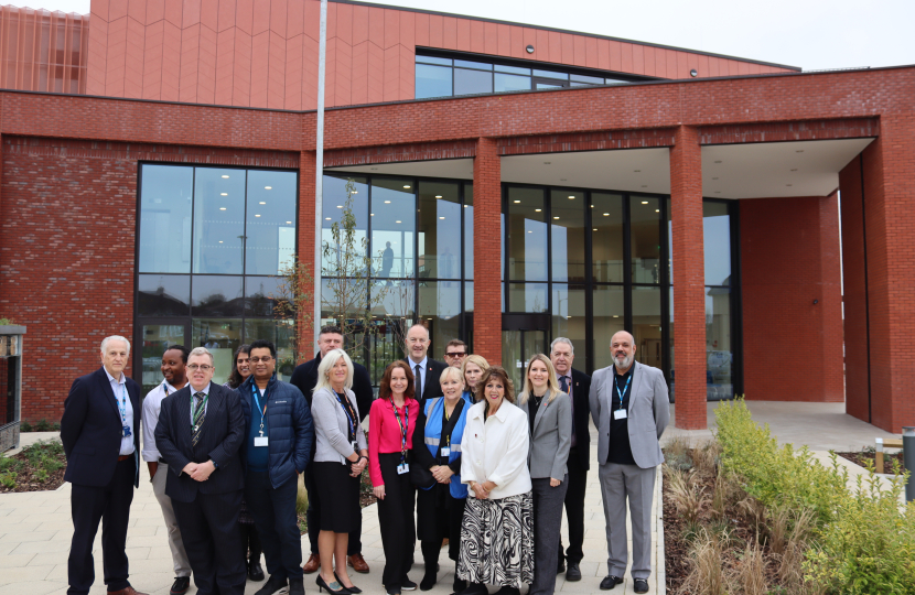 Julia with senior figures outside the St. George's NHS Hub.