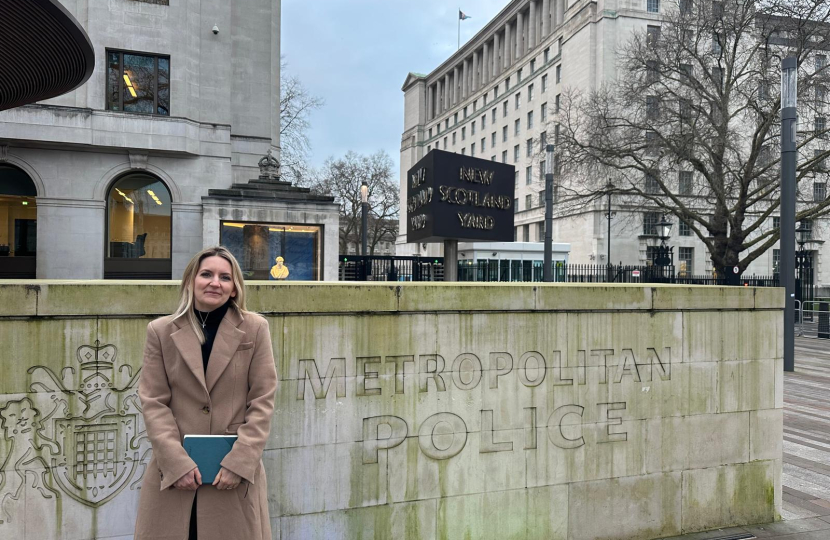 Julia stood outside New Scotland Yard