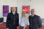 Julia Lopez with Fire Officers at the Older People's Fair at Queen's Theatre Hornchurch