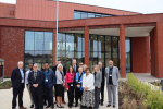 Julia with senior figures outside the St. George's NHS Hub.