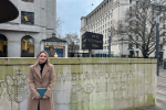 Julia stood outside New Scotland Yard