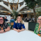 Julia Lopez with two of the debt coaches at a table in Portcullis House