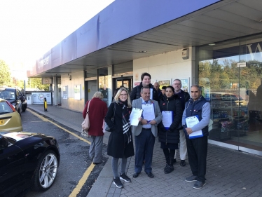 Julia Lopez MP petitioning at Upminster Station.