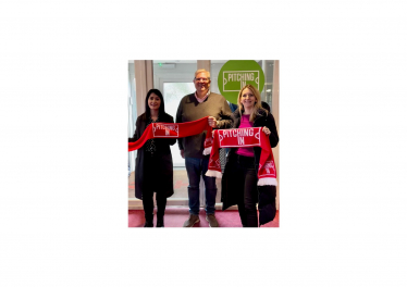 Julia Lopez MP at Hornchurch FC with Grainne Hurst of Entain and Alex Sharp, Hornchurch FC Chairman