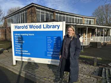 Julia Lopez stood next to the sign for Harold Wood library