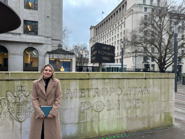 Julia stood outside New Scotland Yard